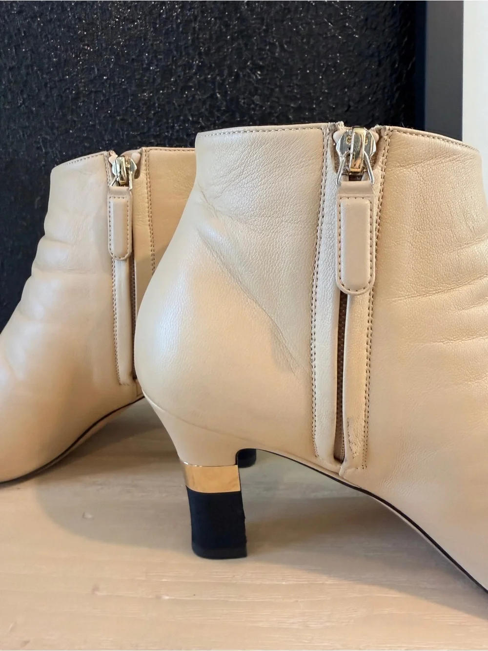 CHANEL Beige Leather Ankle Boots with Black Cap Toe